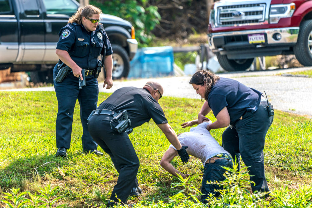 Suspect corralled after foot chase